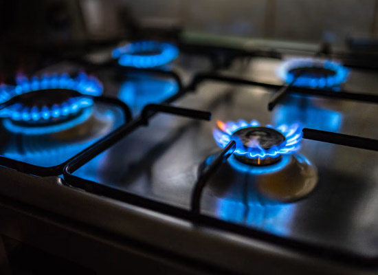 Gas cooktop flame for residential gas plumbing services