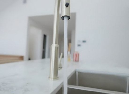 Modern kitchen sink and tap for general plumbing repairs